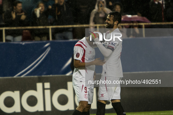 Iborra (R ) and Bacca (L ), players of Sevilla FC, celebratesafter scoring 1-0 during the match of Europa League (Round of 16, 2º leg) betwe...