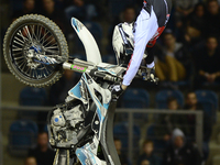 Remi Bizouard, a French FMX rider, during his final jump in the opening day of Diverse NIGHT of the JUMPs in Krakow's Arena. Krakow, Poland....