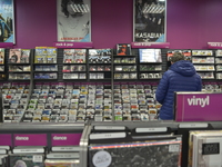 People browsing in a branch of the high-street retail chain HMV in Stockport on Wednesday 25th March 2015. -- CDs, records, music downloads...