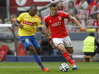 Benfica's Brazilian forward Lima Santos vies with Estoril's Portuguese defender Luis Mendes 