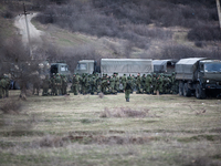 Alleged Russian troops next to the besieged Ukrainian Military Base in Perevalnoye near Simferopol, Crimea (Ukraine) on March 5th, 2014.