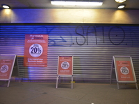 Light shining on a closed retail unit on Monday 30th March 2015. (