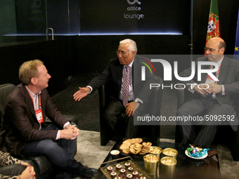 Portugal's Prime Minister Antonio Costa (C ) and Portugals Minister of Economy and Digital Transition Pedro Siza Vieira (R ) meets with Micr...