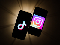 TikTok and Instagram logos are seen displayed on a phone screens in this illustration photo taken in Krakow, Poland on November 14, 2019.  (