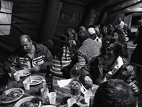 Dinner in the tent camps for earthquake victims, in Sant ' Eusanio Forconese Abruzzo, Italy on April 11, 2009 (