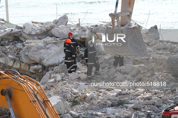 Rescue workers search for survivers under an 11-storey hotel building collapsed at the Black sea resort of St. Konstantin and Helena 450 kms...