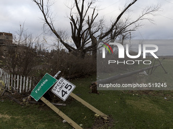 The road sign of the town of Fairdale lays on the side of the road the morning after a tornado struck the town, on Apr 10, 2015 (