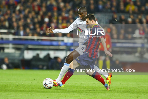 Leo Messi and Toure Yaya (l) in the match between FC Barcelona and Manchester City, for the second leg of the round of 16 of the Champions L...