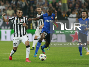 Roberto Pereyra and Geoffrey Kondogbia during the Champions Luague match between Juventus FC and AS Monaco at the Juventus Stafium of Turin...
