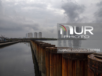  Buildings near the sea at north Jakarta. Besides floods that always hit the capital city of Indonesia, Jakarta is one of the fastest-sinkin...