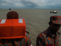 Fire fighters are looking for the missing passenger of sunken passenger vessel Pinak - 6 at Padma river near Mawa Ferry ghat, Dhaka, 4 Augus...