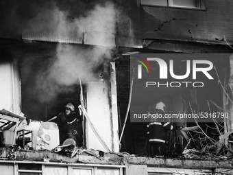 (EDITOR'S NOTE: Image was converted to black and white) A deadly blast killed two people in a block of flats in Varna, some 450 km to the Ea...