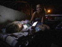  Residents sleeps and spend all the day outside their house due to the fear of the house collapse  in Guanica, Puerto Rico, on 12 January, 2...