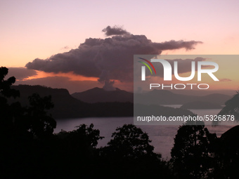 Taal volcano is seen as it is spewing fume in Batangas, Philippines on January 15, 2020. Some people refuse to be evacuated from the danger...