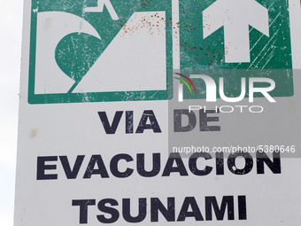Signage with Evacuation route in case of tsunami pictured in Puerto Aisen (Aysen), Patagonia, Chile on 17 December, 2017. Puerto Aisén is a...