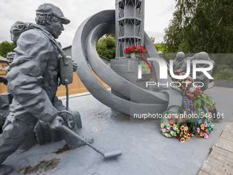 Memorial sculpture in the main entrance to the firemen building in Chernobyl (