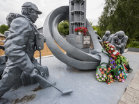 Memorial sculpture in the main entrance to the firemen building in Chernobyl (
