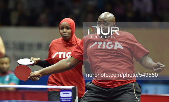 (150427) -- SUZHOU, April 27, 2015 () -- Sudan's Mohamed Salah(R)/Elzibag Kauther compete against Mexico's Yadira Silva/Marcos Madrid during...