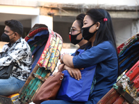 Bangladeshi people wearing facemasks during travel on the street as a preventive measure against the spread of the COVID-19 coronavirus outb...