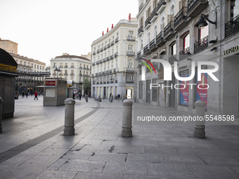 A general view of desserted Puerto de Sol street a day after the Government declared the state of alarm in Spain and recommended people to s...