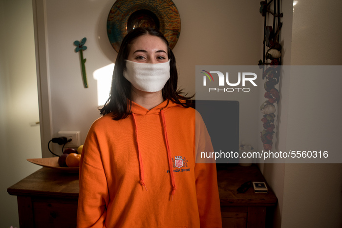 A student of University of Ferrara wears a protective mask. The University has set up online courses during the quarantine. Faenza, 13 March...
