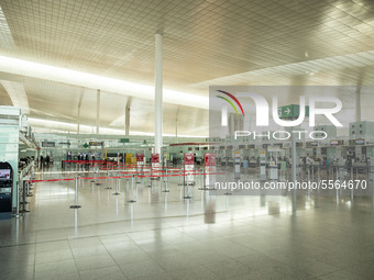 Empty Barcelona El Prat airport after the state of alarm imposed by the spanish government and measure of lockdown the population of Catalon...