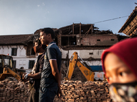People are  crossing the broken heritgae of Durbar Square, Katmandu, nepal, 03 May 2015. (