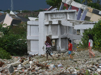 A number of residents were left behind by their settlements destroyed by the earthquake and liquefaction disaster in Balaroa Village, Palu C...