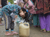 KATHMANDU, NEPAL-- April 30, 2015-- Water was distributed in the village of Bangamati, a village which sustained heavy damage on the outskir...