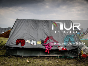 People are drying their clothes on the tent roof. Tudikhel temporary shelter, Kathmandu, 1st May 2015. The official death toll climbed to ov...