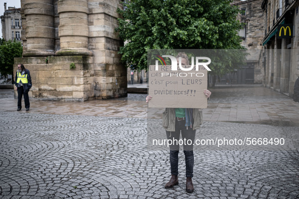 May Day in Bordeaux France, on May 1, 2020, a small group of people demonstrate in the street during the confinement before being checked by...