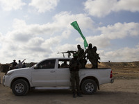 Palestinians militants from Izz al-Din al-Qassam Brigades Hamas military wing during rally marking Nakba day in northern of the Gaza Strip,...