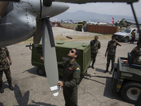 KATHAMNDU, NEPAL-- May 6, 2015--Nepalese Army officials prepare a plane in order to air drop aid to remote, earthquake-affected areas not ac...