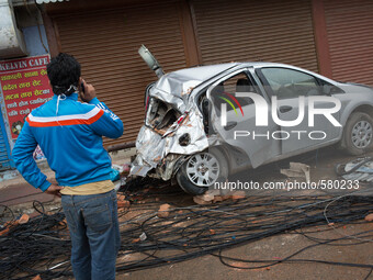 A destroyed car at Sundhara, Kathmandu, Nepal. May 1, 2015. (