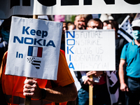 Several hundred employees of the Nokia group, including those at the Lannion plant, gathered in Paris, France, on July 8, 2020 for a large d...