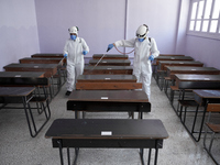 Members of civil defense known as white helmets sterilize school classes after discovering 3 COVID-19 cases in Idlib, Syria on July 11, 2020...
