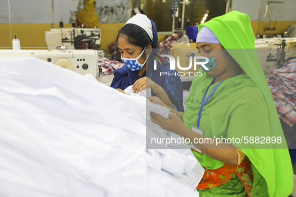 Ready made garments workers works in a garments factory in Dhaka on July 25, 2020. 