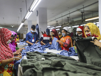 Ready made garments workers works in a garments factory in Dhaka on July 25, 2020. (