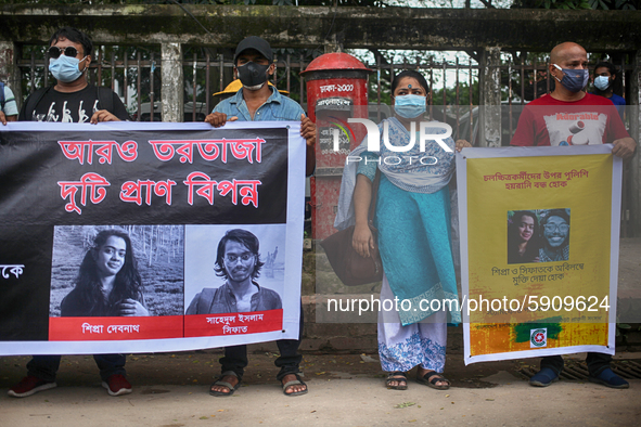 Students of Stamford University form a human chain in front of National Press Club in Dhaka, Bangladesh on August 06, 2020. As their fellow...