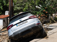 Damage from the flood disaster, effects of climate change. Scenes from the flooded coastal town of Bourtzi. Cars were swept away by the floo...