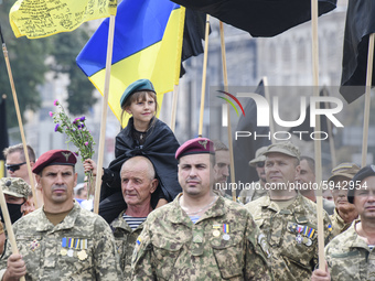 Ukrainian veterans of war on east of Ukraine take part in the March of Defenders of Ukraine dedicated to Independence Day celebration in Kyi...