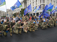 Ukrainian veterans of war on east of Ukraine take part in the March of Defenders of Ukraine dedicated to Independence Day celebration in Kyi...