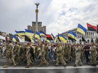 Spectators react  during the March of Defenders of Ukraine dedicated to Independence Day celebration in Kyiv, Ukraine, 24 August 2020. (Phot...
