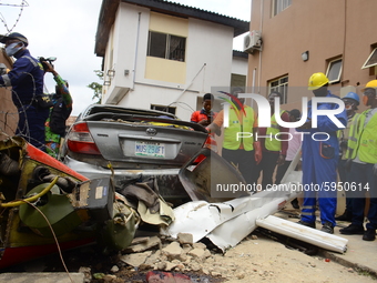 Officers and rescue teams amidst debris after a Quorom helicopter crash, a helicopter operated by Quorom Aviation which crashed in 16A Salva...
