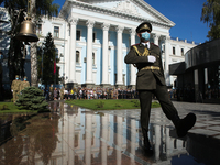 Guard marches near the Monument of Fallen Heroes during the commemorative ceremony at the territory of Defence Ministry in Kyiv, Ukraine, Au...