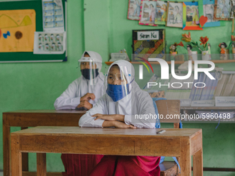Students pay attention to the teacher at Candirejo Elementary School, Semarang Regency, Central Java, Indonesia, on September 1, 2020. Local...