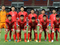 North Korea players pose for a team picture before an international friendly match against Thailand at Rajamangala Stadium in Bangkok, Thail...