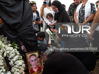 Samira Makki cryes over the picture of her husbuand on the memory gathering one month after the port blast,on September 4,2020, Beirut ,Leba...