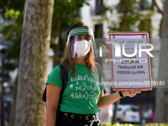 A protester hold a placard reading `On strike because we want to work without losing our livesin Madrid on 5th September, 2020. (