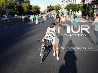 A protester hold a placard reading `Public education for all and for all´in Madrid on 5th September, 2020. (